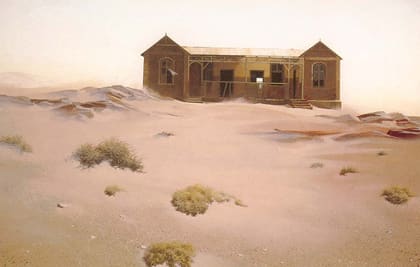 Ein Haus im Sand – kolorierte Aufnahme aus der Zeit nach der Aufgabe